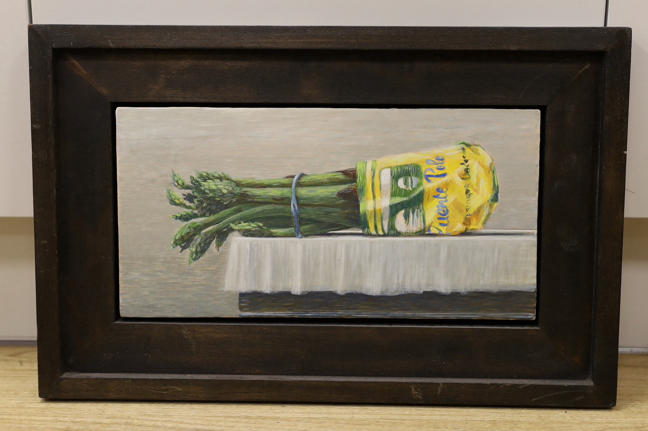 French School, oil on board, Still life of a bunch of asparagus, 18 x 36cm